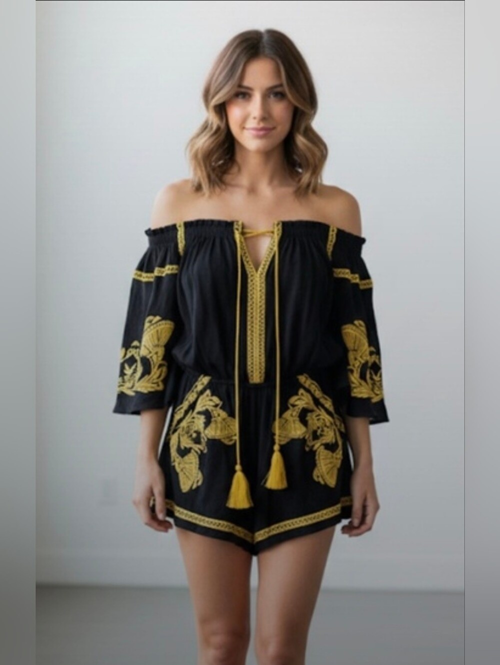 Off-Shoulder Black Romper with Gold Embroidery